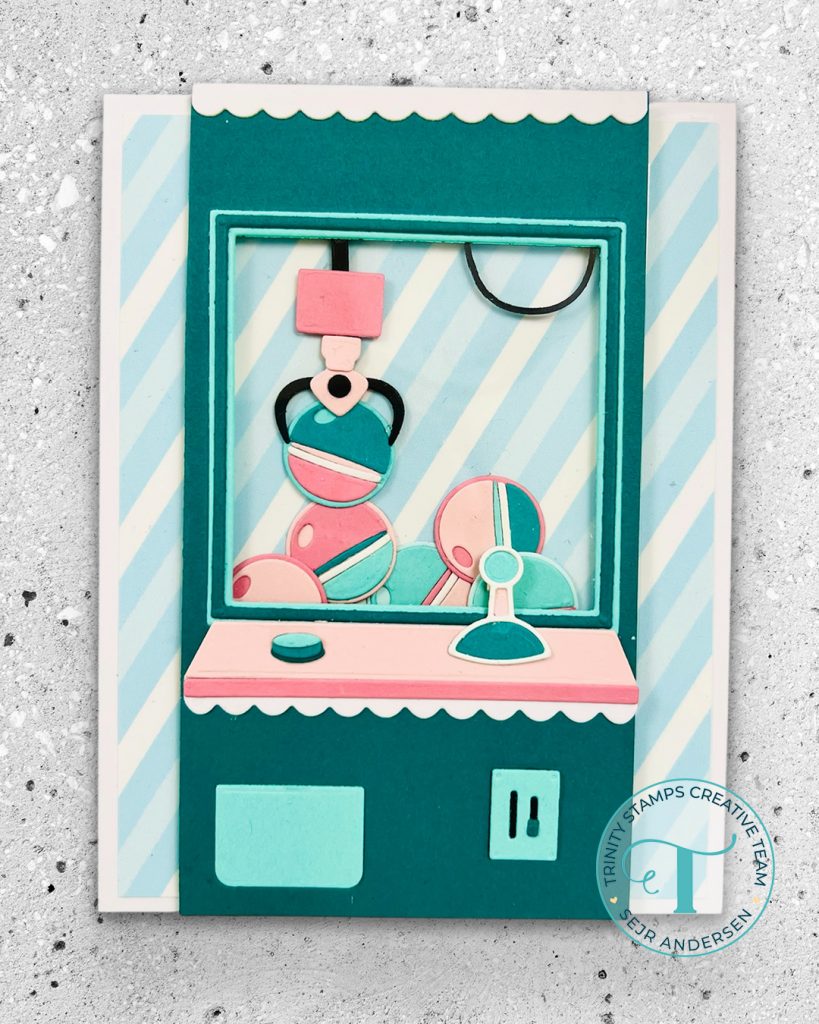 A Gashaphon machine birthday card in shades of teal and pink cardstock.